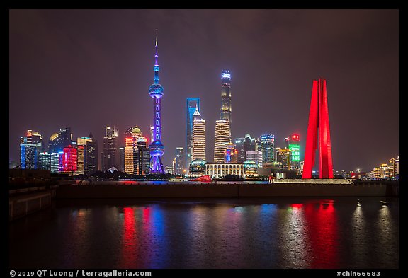 Peoples Memorial and city skyline at night. Shanghai, China (color)