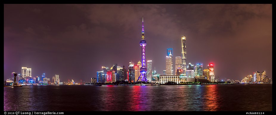 Shanghai city skyline from the Bund at night. Shanghai, China (color)