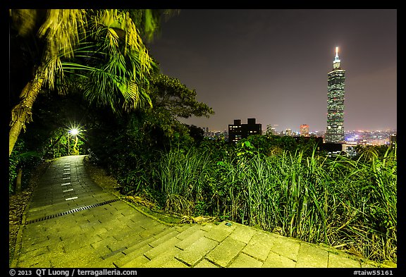 Path on Elephant Mountain with Taipei 101 in the distance at night. Taipei, Taiwan