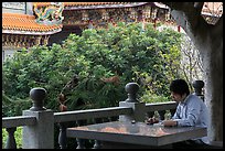 Man reading, Guandu Temple. Taipei, Taiwan ( color)