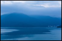 Itashao Village and cloud-shrounded mountains at dawn. Sun Moon Lake, Taiwan ( color)