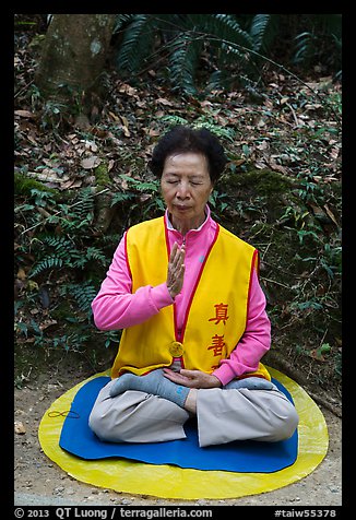 Woman meditating. Sun Moon Lake, Taiwan