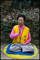 Woman meditating. Sun Moon Lake, Taiwan ( color)