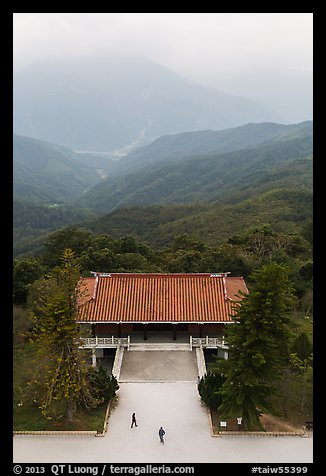 Two people, temple, and misty mountains, Tsen Pagoda. Sun Moon Lake, Taiwan (color)