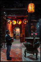 Man praying to Matsu, Tienhou Temple. Lukang, Taiwan (color)