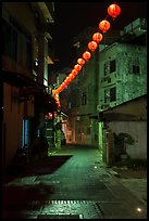 Red paper lanterns glowing in  Nine-turns lane at night. Lukang, Taiwan ( color)