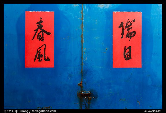 Blue door detail wiht Chinese script on red. Lukang, Taiwan