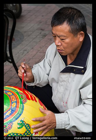 Man painting paper lantern. Lukang, Taiwan