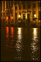 Lights reflected in wet cobblestones, Grand Place. Brussels, Belgium