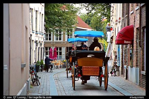Horse carriage in a narrow street. Bruges, Belgium