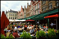 People in restaurants on the Markt. Bruges, Belgium ( color)