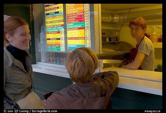 Women at a fries booth. Bruges, Belgium (color)