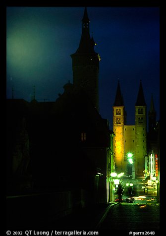 Rathaus and Neumunsterkirche seen fron Alte Mainbrucke (bridge) at night. Wurzburg, Bavaria, Germany