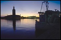 Fishing boat and Stadshuset. Stockholm, Sweden ( color)