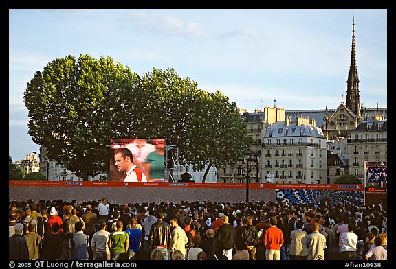 Crowds watch a broadcast of a soccer match near Hotel de Ville. Paris, France