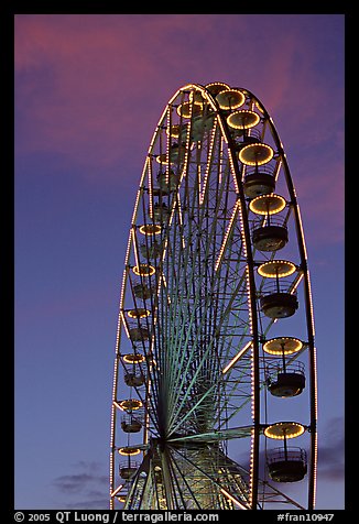 Tuileries Ferris wheel at sunset. Paris, France