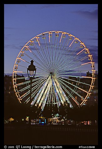 Ferris wheel in the jardin des Tuileries at sunset. Paris, France