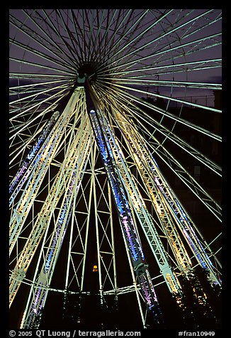 Lighted Ferris wheel in the Tuileries garden. Paris, France