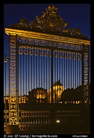 Versailles Palace gates at night. France