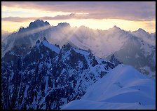 Sunrays over Chamonix Aiguilles, Aiguille Verte, Droites, and Courtes, Chamonix. France (color)