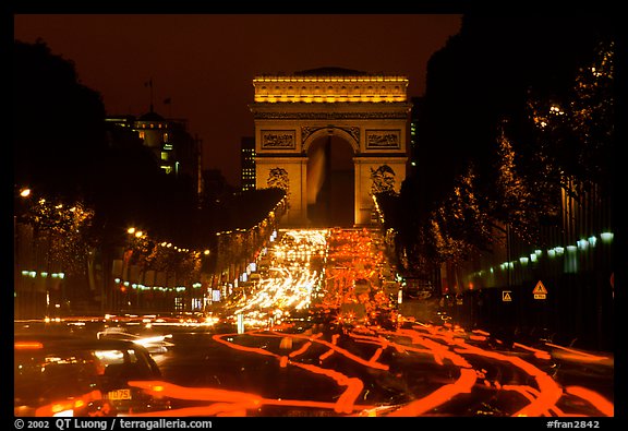 Arc de Triomphe and Champs Elysees at night. Paris, France (color)