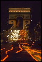 Arc de Triomphe and lights of cars on Champs Elysees. Paris, France (color)