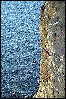 Rock climbing above water in the Calanque de Morgiou. Marseille, France ( color)