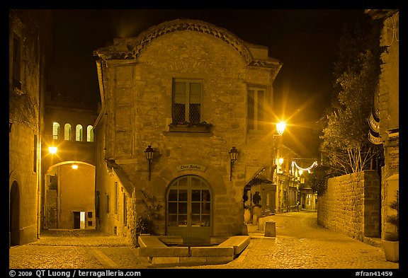 Stone buildings and streets at night. Carcassonne, France