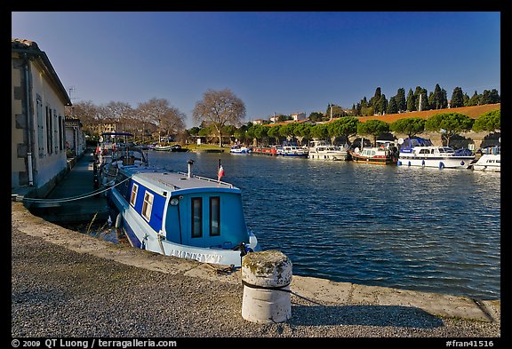 Basin with riverboats anchored, Canal du Midi. Carcassonne, France