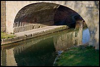 Stone bridge across Canal du Midi. Carcassonne, France