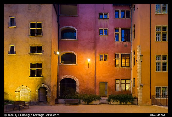 Maison des Avocats facade at night with lights. Lyon, France