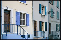 Facade of townhouses with colorful shutters. Arles, Provence, France ( color)