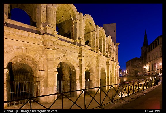 Arenes and church at night. Arles, Provence, France (color)