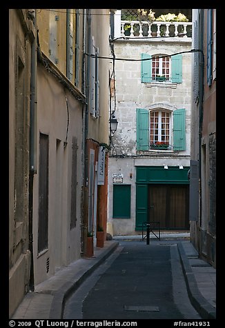 Narrow street in old town. Arles, Provence, France