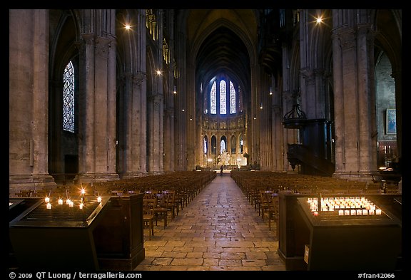 Candles and nave inside Cathedrale Notre-Dame de Chartres. France