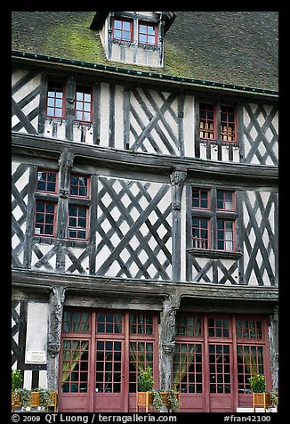 Facade of medieval half-timbered house, Chartres. France (color)