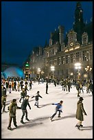 Holiday ice ring, City Hall by night. Paris, France ( color)