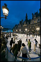 Holiday skating rink at night, City Hall. Paris, France ( color)