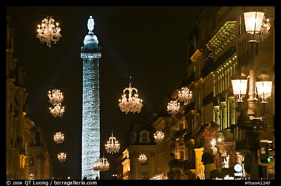 Christmas lights and Place Vendome column by night. Paris, France (color)