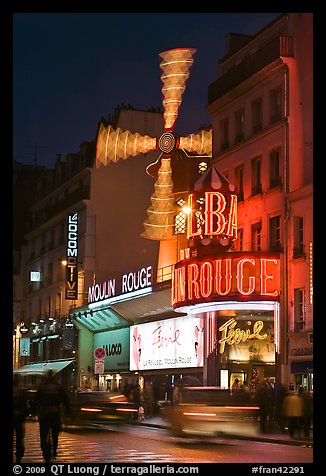 Moulin Rouge (Red Mill) Cabaret by night. Paris, France