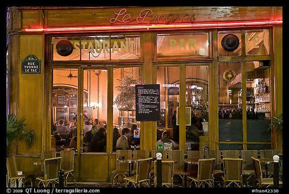 Popular cafe restaurant by night. Paris, France