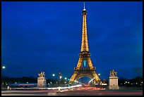 Eiffel Tower seen across Iena Bridge at night. Paris, France