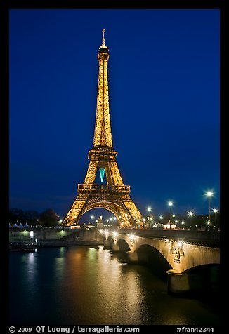 Seine River, Iena Bridge, and illuminated Eiffel Tower. Paris, France