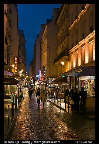 Pedestrian street with restaurants at night. Quartier Latin, Paris, France