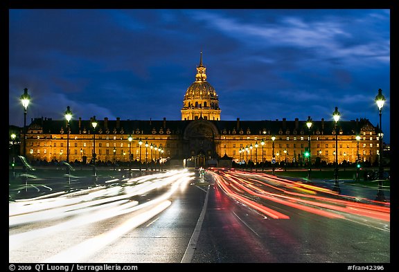 Les Invalides hospital and chapel dome with light trails from traffic. Paris, France