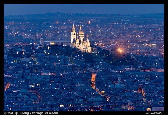 Montmartre Hill and Sacre-Coeur basilica at night. Paris, France