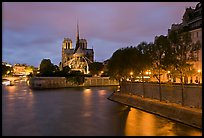 Banks of the Seine River, Ile de la Cite, Ile Saint Louis, and Notre Dame at twilight. Paris, France