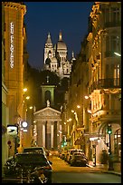 Street, Notre-Dame-de-Lorette, and Sacre Coeur at night. Paris, France ( color)