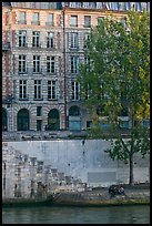 Quay and riverfront buildings on banks of the Seine. Paris, France ( color)