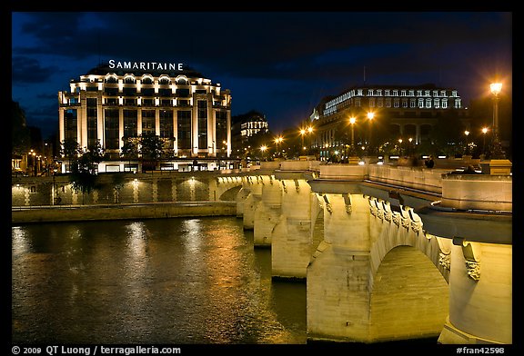 Pont Neuf and Samaritaine illuminated at night. Paris, France